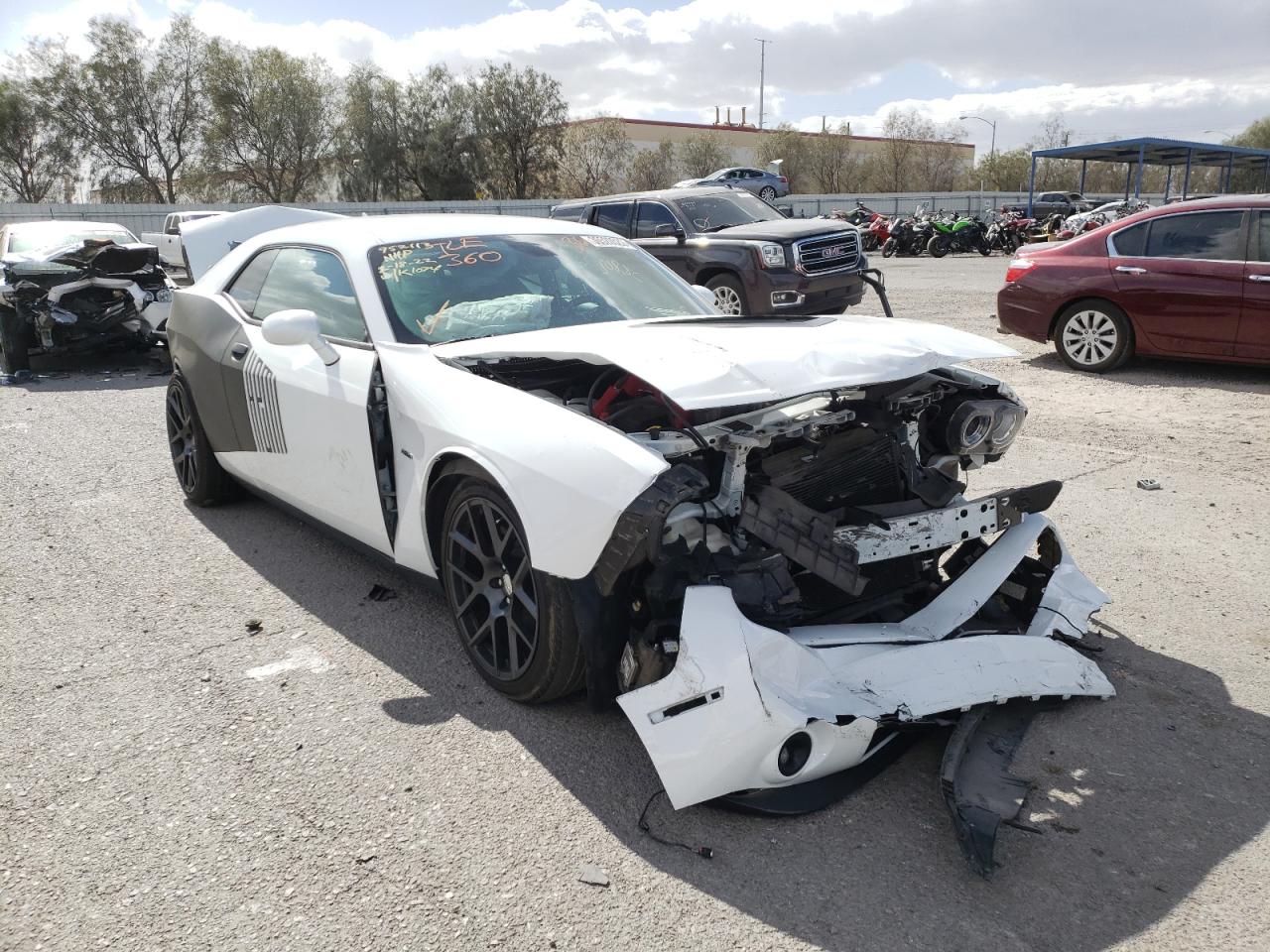 DODGE CHALLENGER 2016 with VIN 2C3CDZBT7GH337658 - Photo from auction