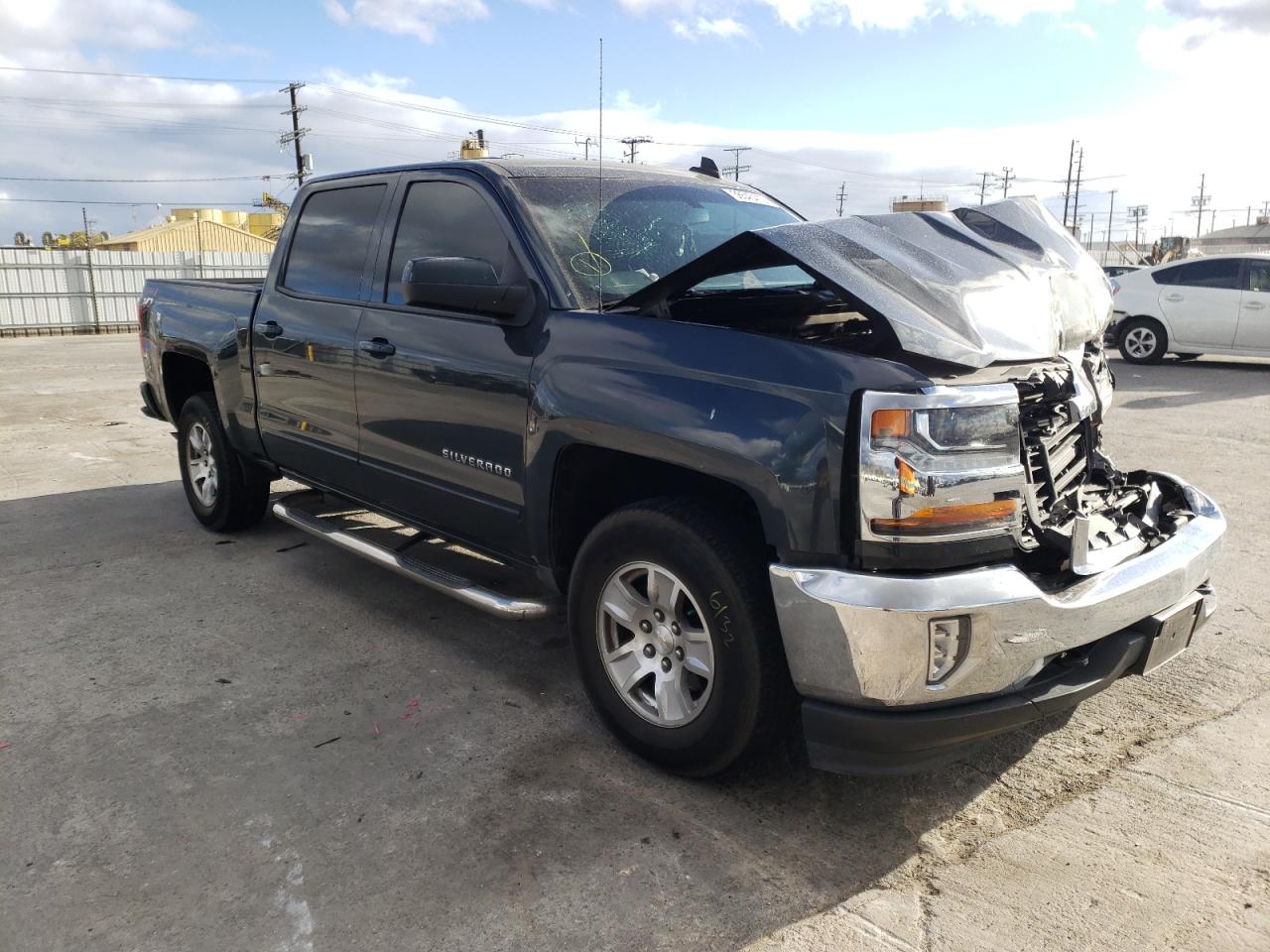 CHEVROLET SILVERADO 2018 with VIN 3GCUKREC4JG240569 - Photo from auction