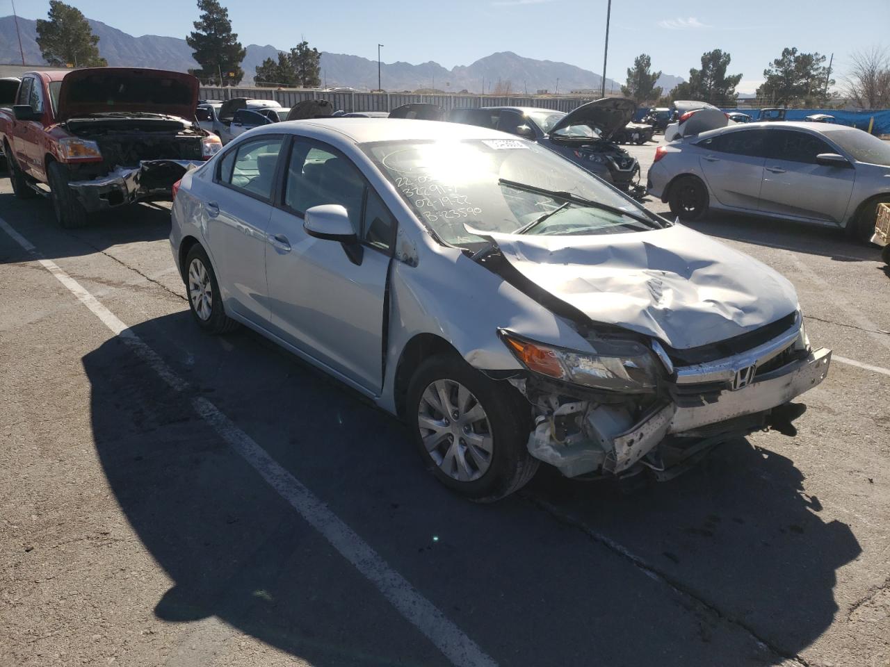 HONDA CIVIC LX 2012 with VIN 2HGFB2F55CH593102 - Photo from auction