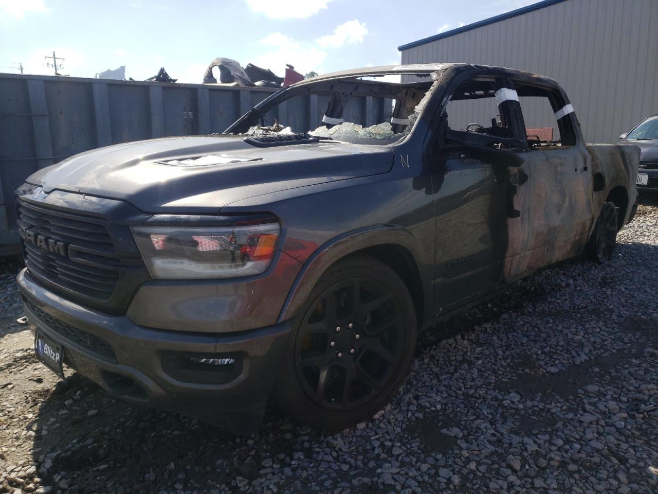 Photo 2 from auction – 2021 RAM 1500 LARAM with VIN 1C6SRFJT1MN624089