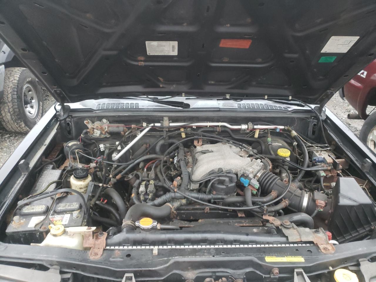 Photo 7 from auction – 2000 NISSAN FRONTIER X with VIN 1N6ED26Y6YC430044