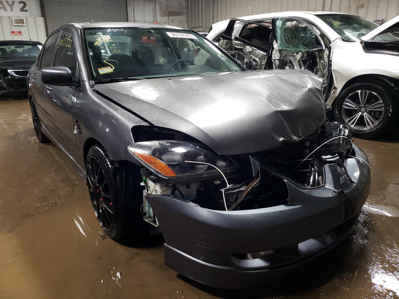 MITSUBISHI LANCER 2005 with VIN JA3AJ66F15U030817 - Photo from auction