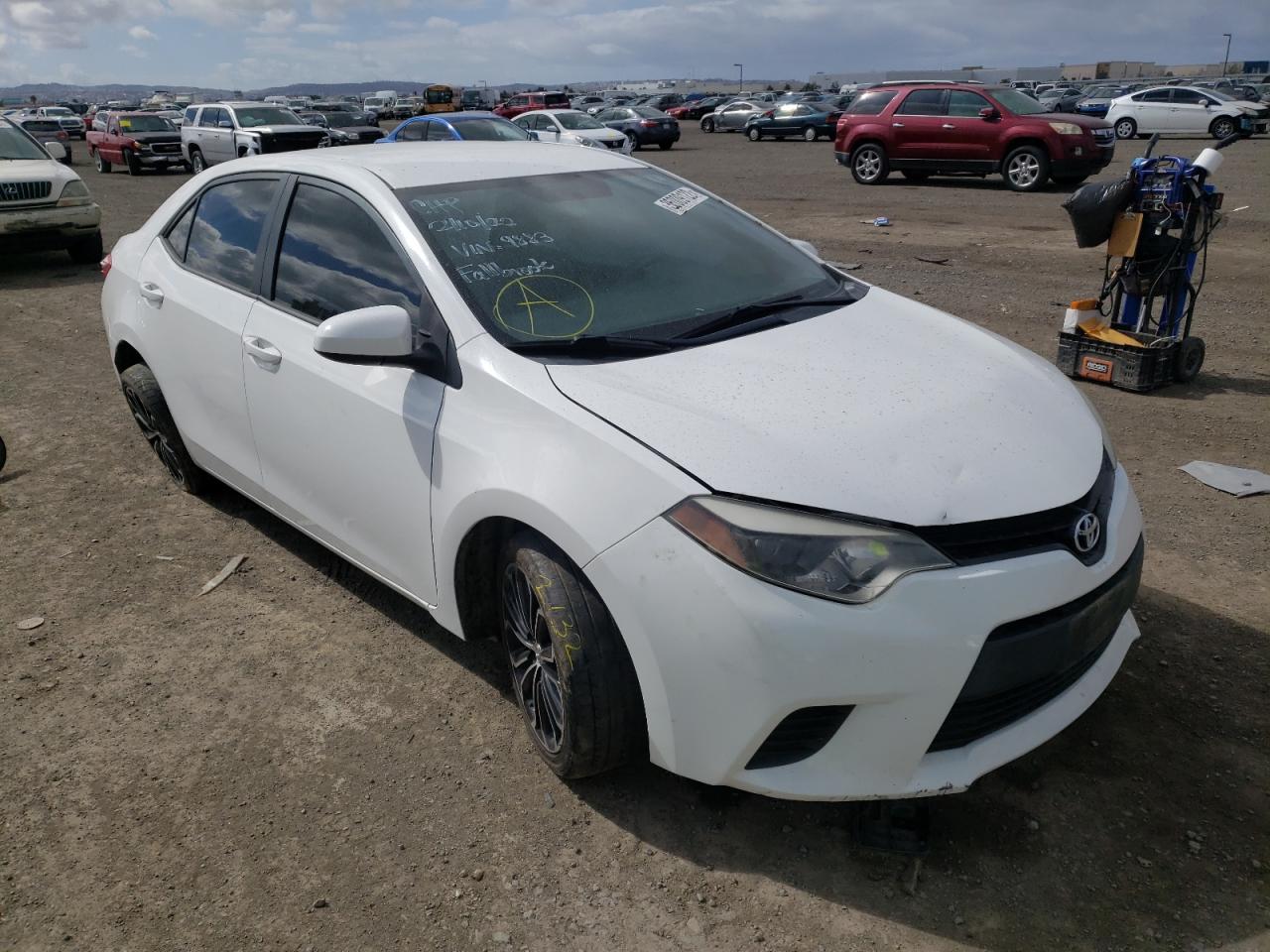 TOYOTA COROLLA L 2014 with VIN 5YFBURHE9EP029883 - Photo from auction