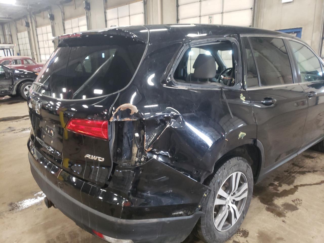 Photo 9 from auction – 2016 HONDA PILOT EXL with VIN 5FNYF6H51GB030611
