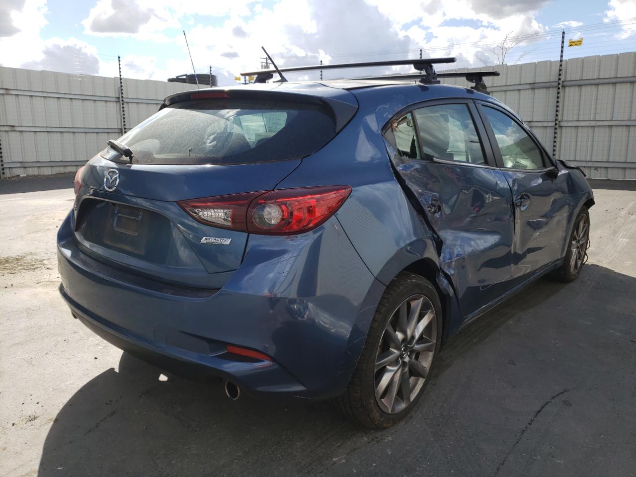 Photo 4 from auction – 2018 MAZDA 3 TOURING with VIN 3MZBN1L34JM165793