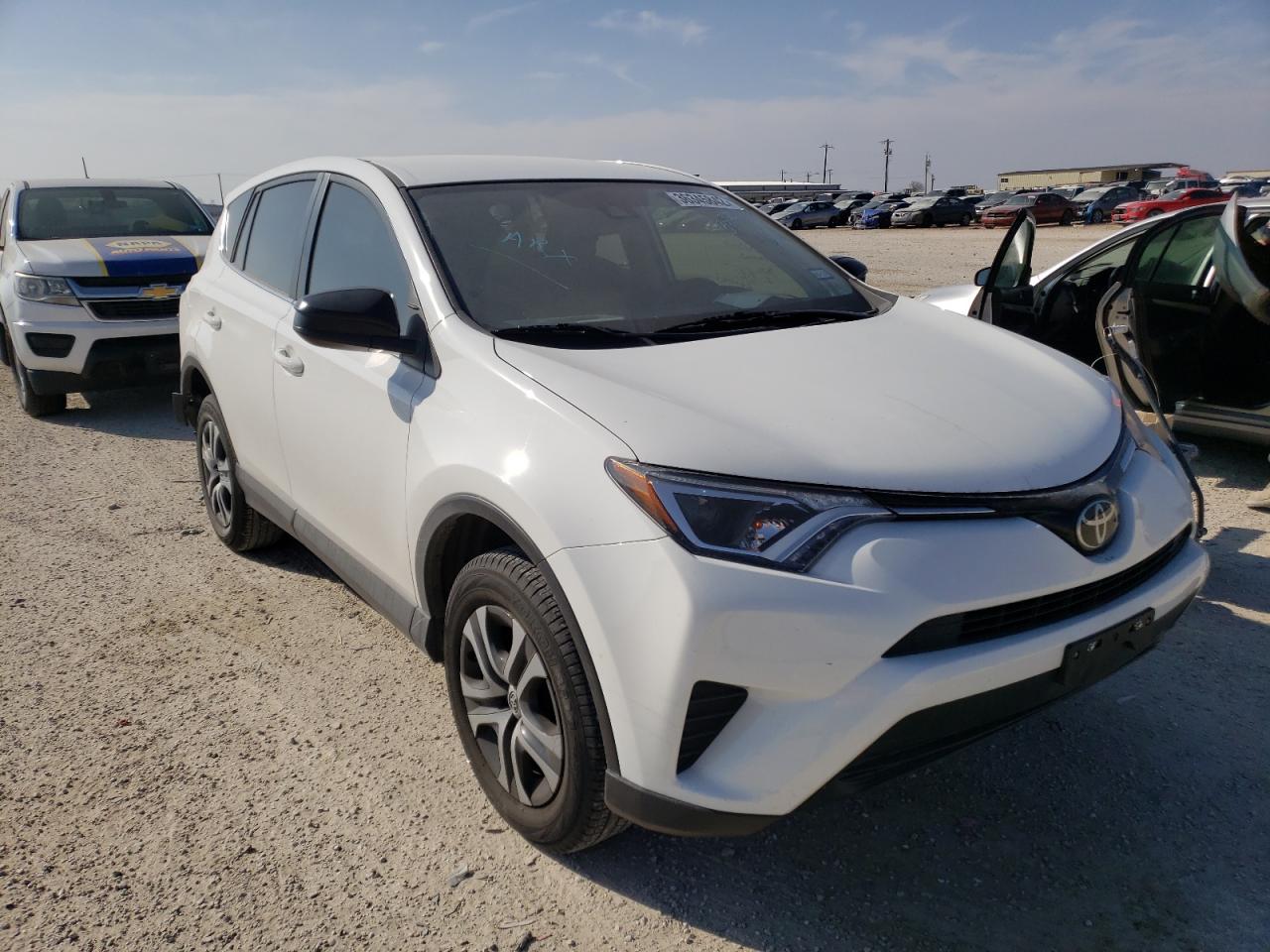 TOYOTA RAV4 LE 2018 with VIN JTMZFREV3JJ172601 - Photo from auction