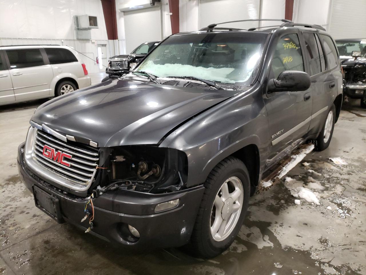 Photo 2 from auction – 2006 GMC ENVOY with VIN 1GKDT13S362283572