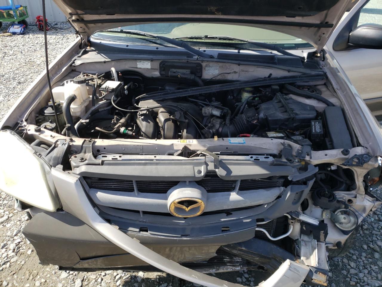 Photo 7 from auction – 2002 MAZDA TRIBUTE LX with VIN 4F2YU09132KM28641