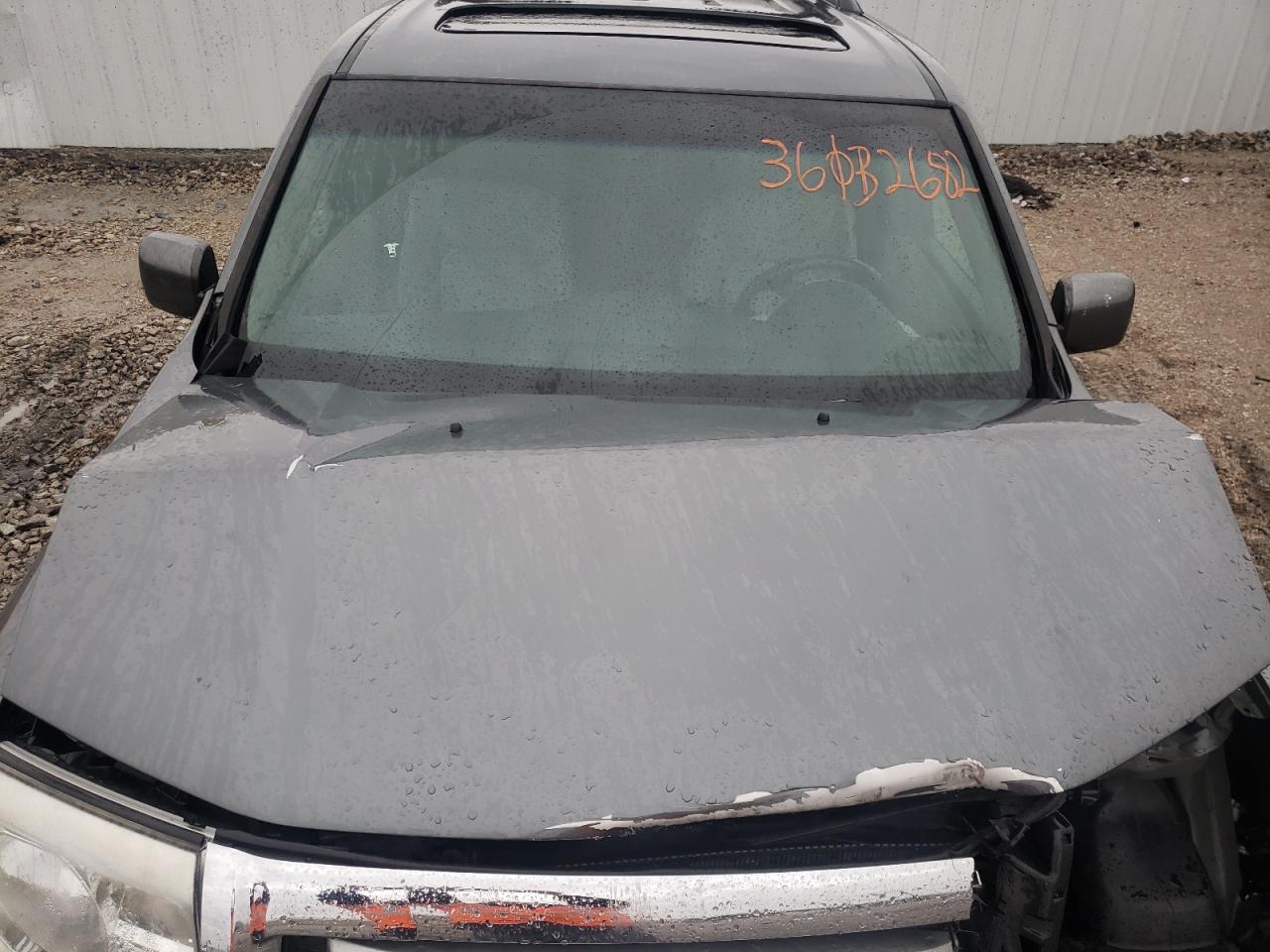 Photo 7 from auction – 2010 HONDA PILOT EXL with VIN 5FNYF4H52AB034937