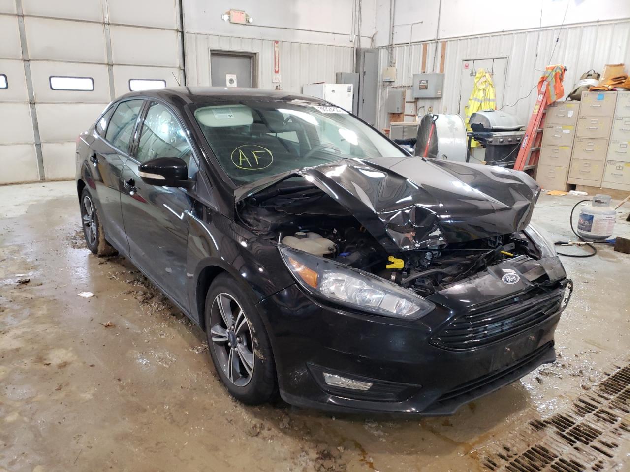 FORD FOCUS SE 2016 with VIN 1FADP3FE3GL225335 - Photo from auction