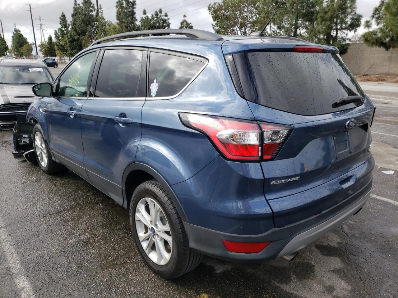 Photo 3 from auction – 2018 FORD ESCAPE SE with VIN 1FMCU0GD8JUA85945