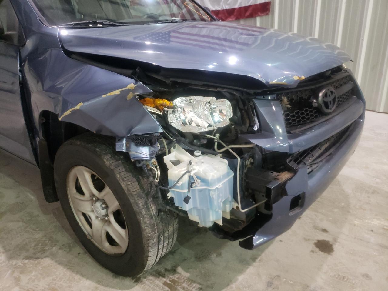 Photo 9 from auction – 2009 TOYOTA RAV4 with VIN JTMBF33V495010904