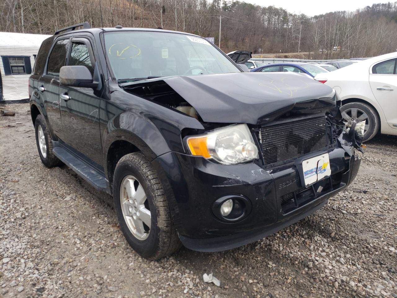 FORD ESCAPE XLT 2011 with VIN 1FMCU0DG9BKA31792 - Photo from auction