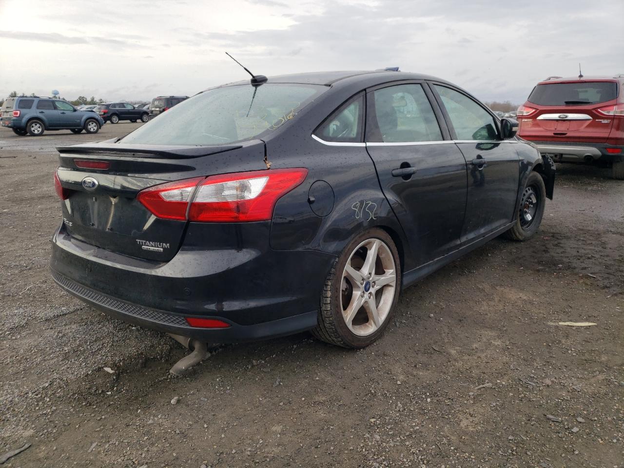 Photo 4 from auction – 2014 FORD FOCUS TITA with VIN 1FADP3J20EL166335