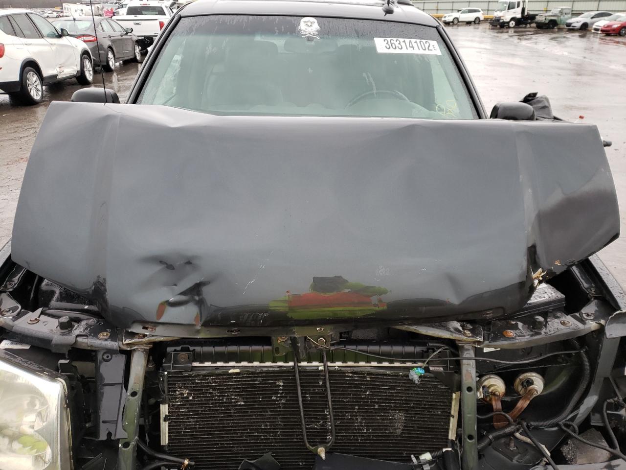 Photo 7 from auction – 2004 GMC ENVOY XL with VIN 1GKET16S346163471