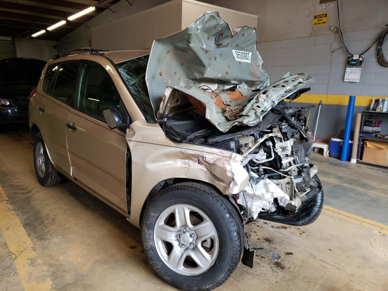 TOYOTA RAV4 2010 with VIN JTMBK4DV8AD011032 - Photo from auction