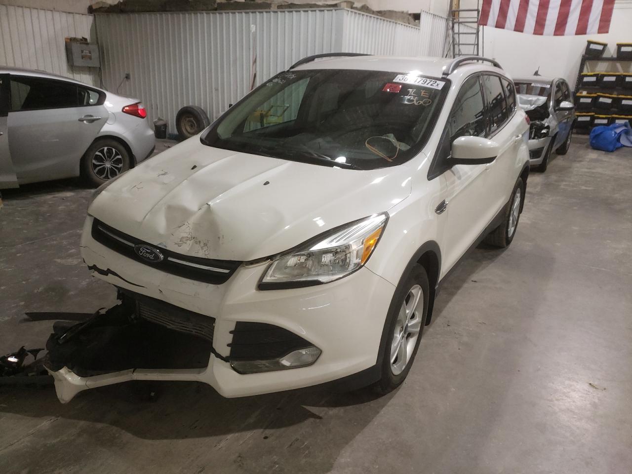 Photo 2 from auction – 2014 FORD ESCAPE SE with VIN 1FMCU9G92EUA29845