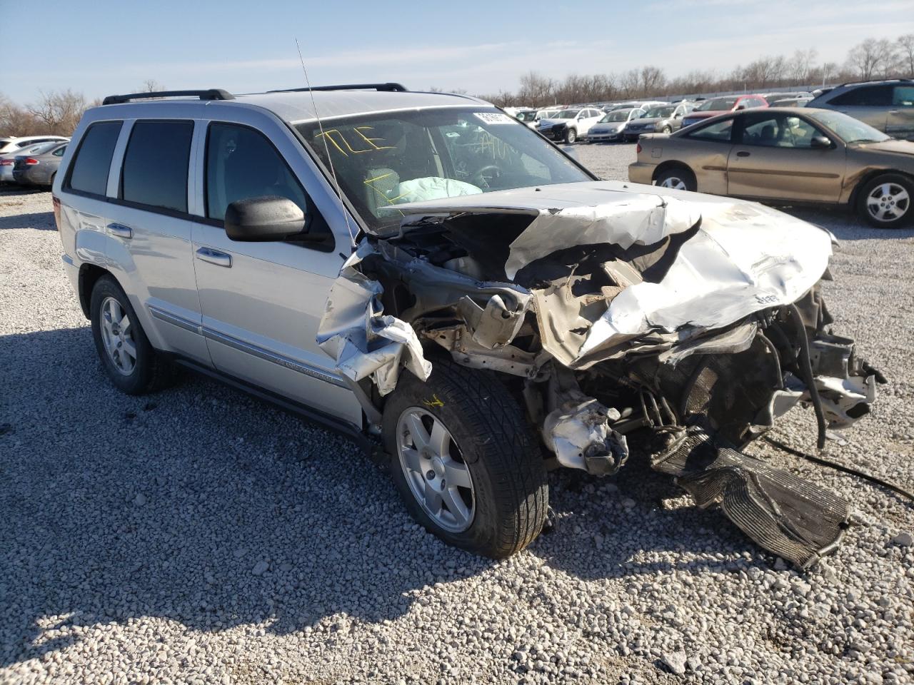 JEEP GRAND CHER 2010 with VIN 1J4PR4GK5AC124584 - Photo from auction