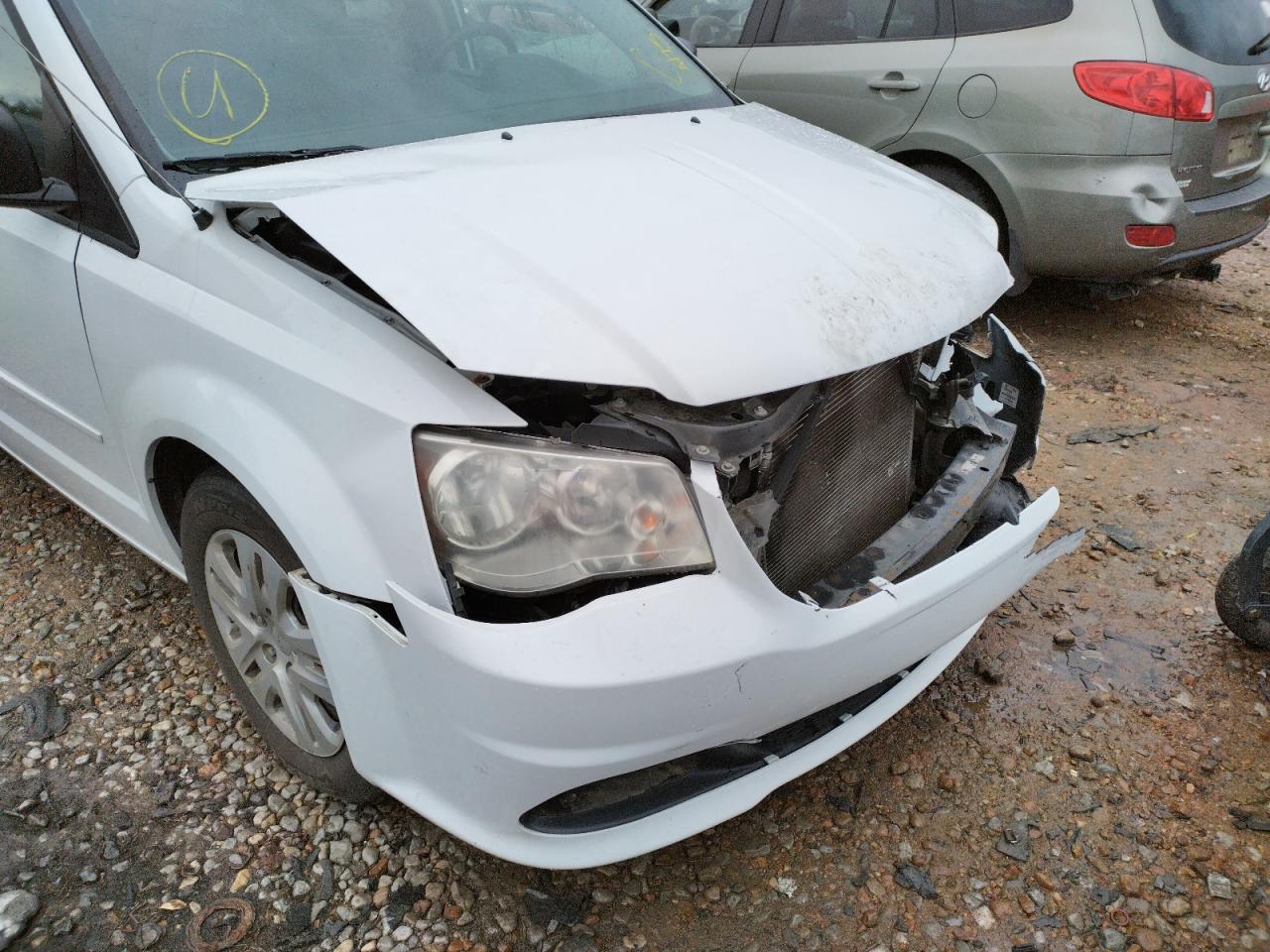 Photo 9 from auction – 2014 DODGE UK with VIN 2C4RDGBG2ER354548