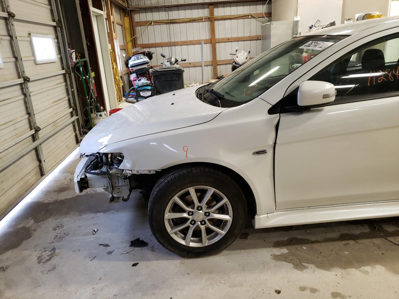 Photo 9 from auction – 2016 MITSUBISHI LANCER ES with VIN JA32U2FU8GU001305