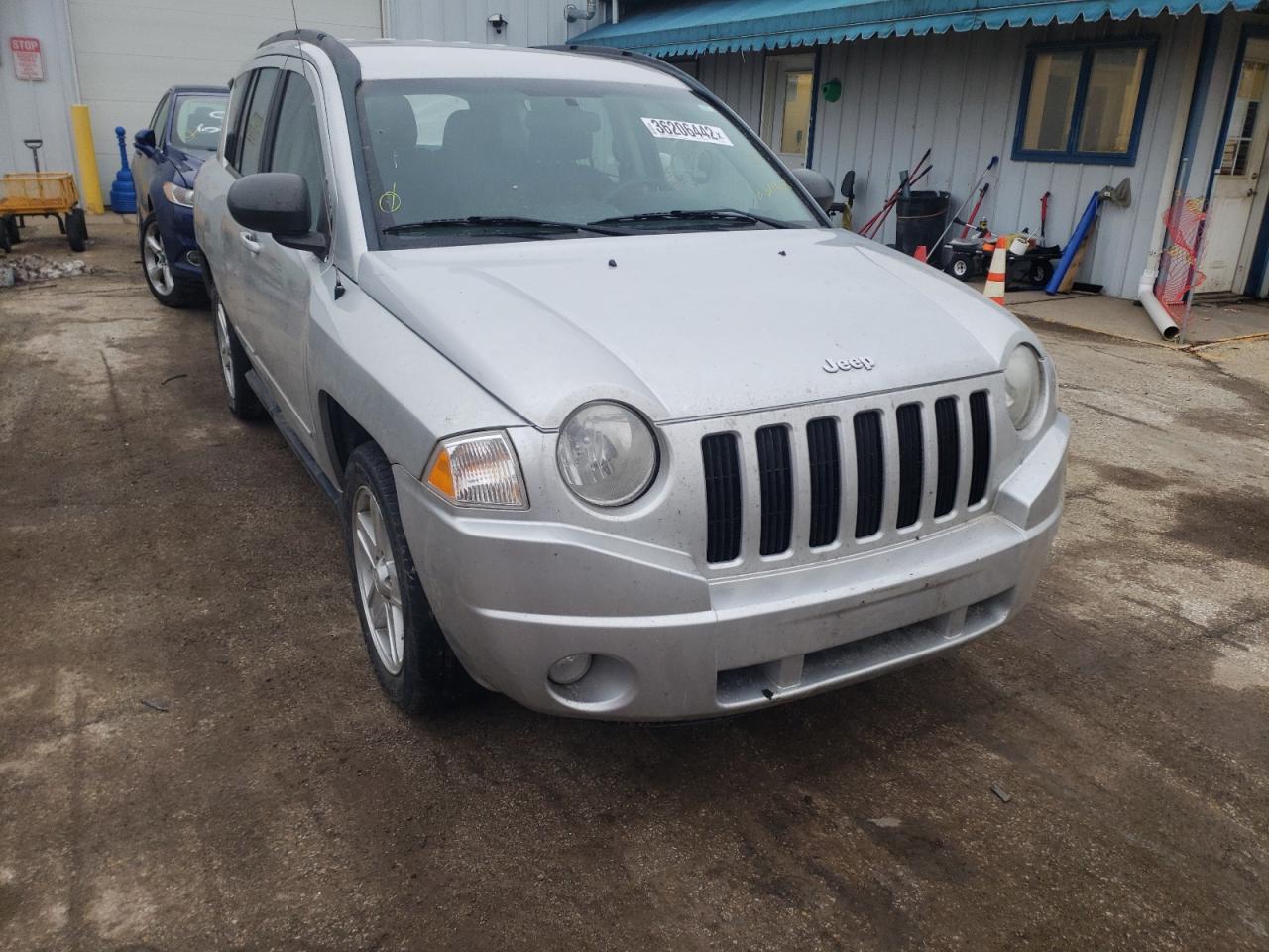 JEEP COMPASS SP 2010 with VIN 1J4NF4FB1AD631428 - Photo from auction