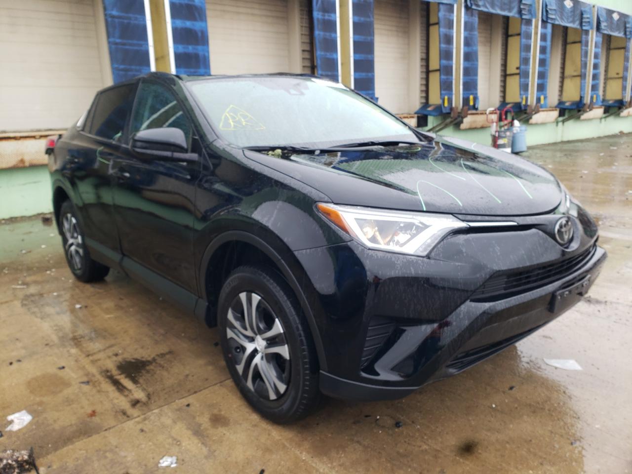 TOYOTA RAV4 LE 2018 with VIN 2T3ZFREV6JW467404 - Photo from auction
