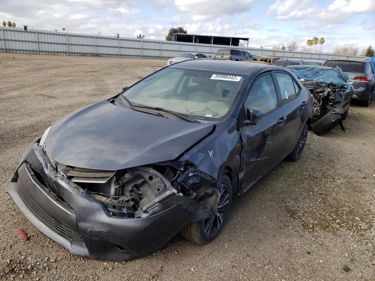 Photo 2 from auction – 2016 TOYOTA COROLLA L with VIN 5YFBURHE8GP551665