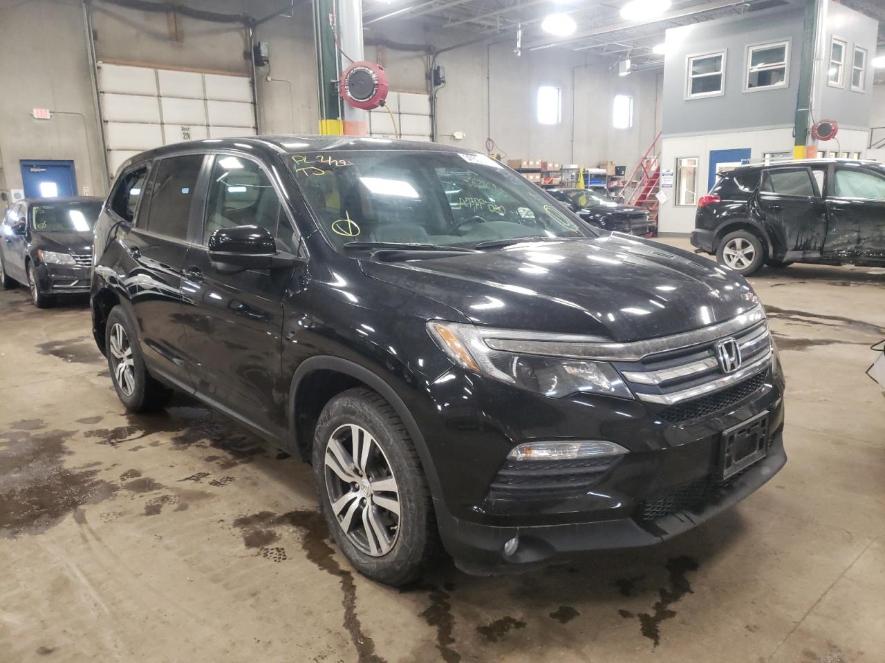 HONDA PILOT EXL 2016 with VIN 5FNYF6H51GB030611 - Photo from auction