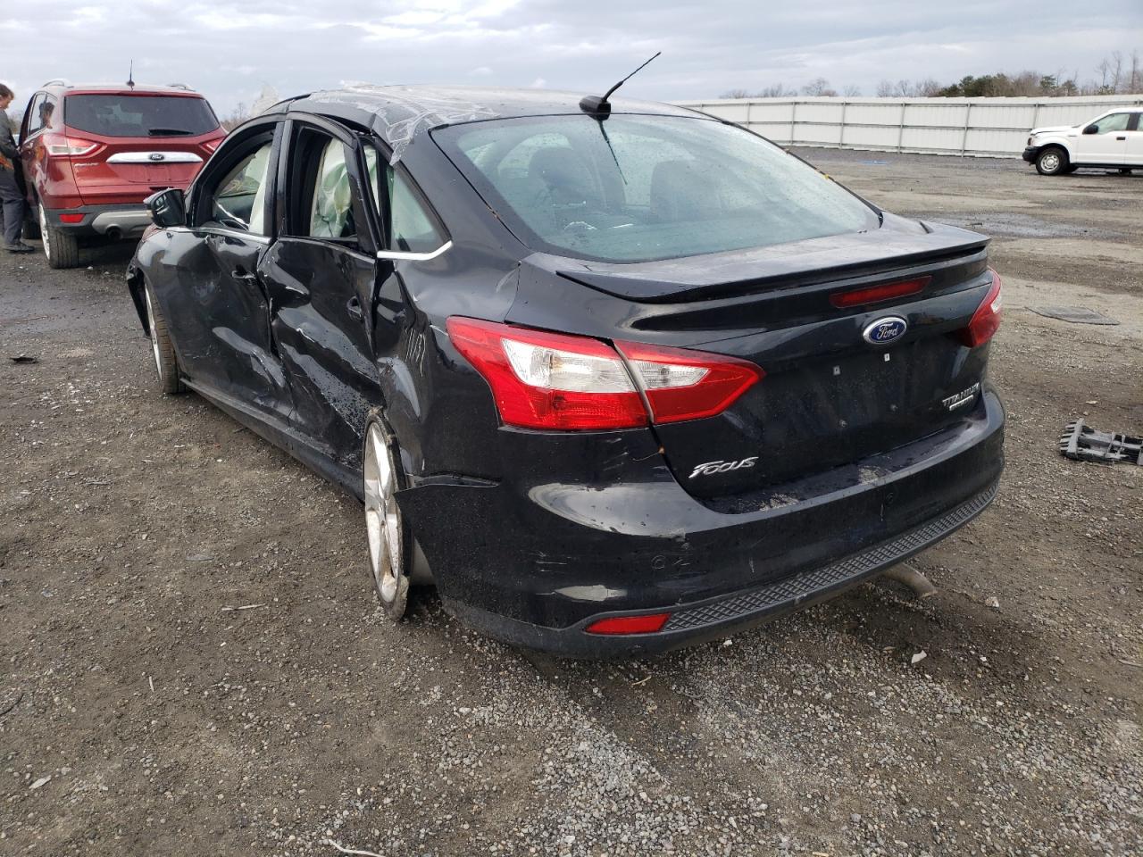 Photo 3 from auction – 2014 FORD FOCUS TITA with VIN 1FADP3J20EL166335