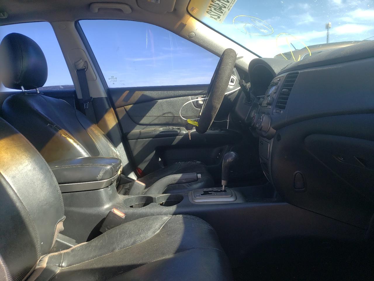Photo 5 from auction – 2006 KIA OPTIMA LX with VIN KNAGE124465045585