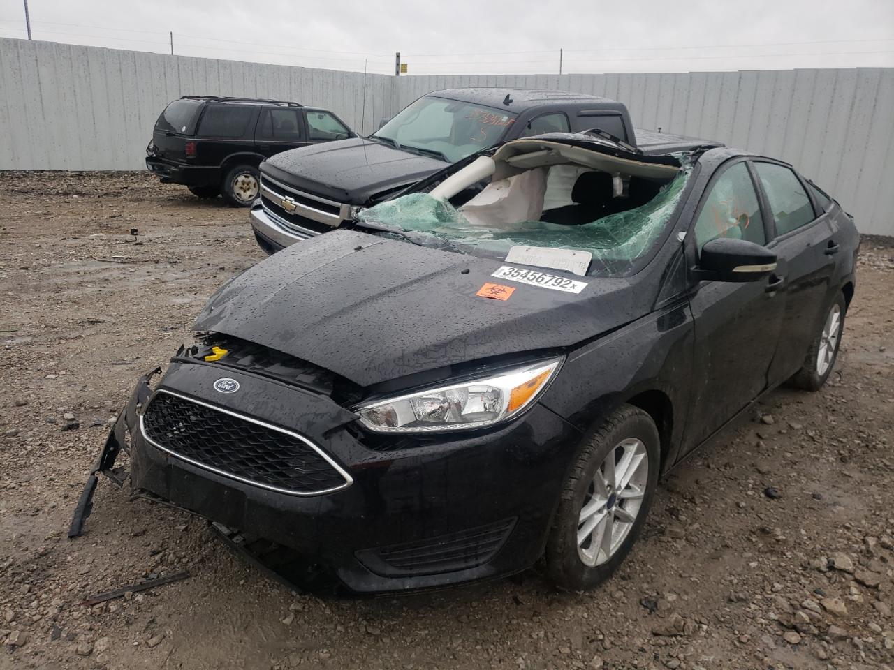 Photo 2 from auction – 2016 FORD FOCUS SE with VIN 1FADP3F29GL318821