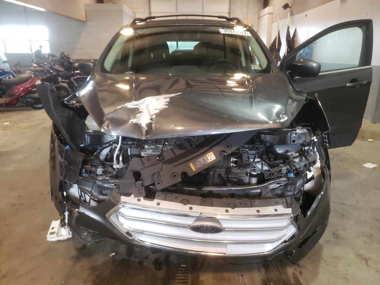 Photo 9 from auction – 2018 FORD ESCAPE SEL with VIN 1FMCU9HD9JUD12319