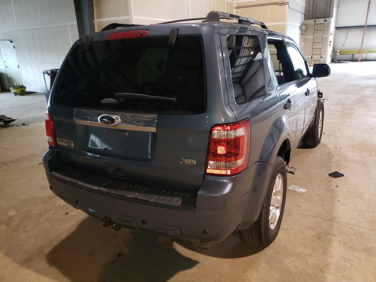 Photo 4 from auction – 2011 FORD ESCAPE LIM with VIN 1FMCU9EG8BKB79323