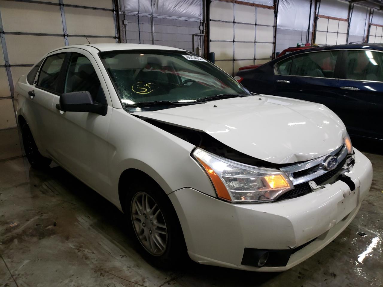 FORD FOCUS SE 2011 with VIN 1FAHP3FN6BW117705 - Photo from auction