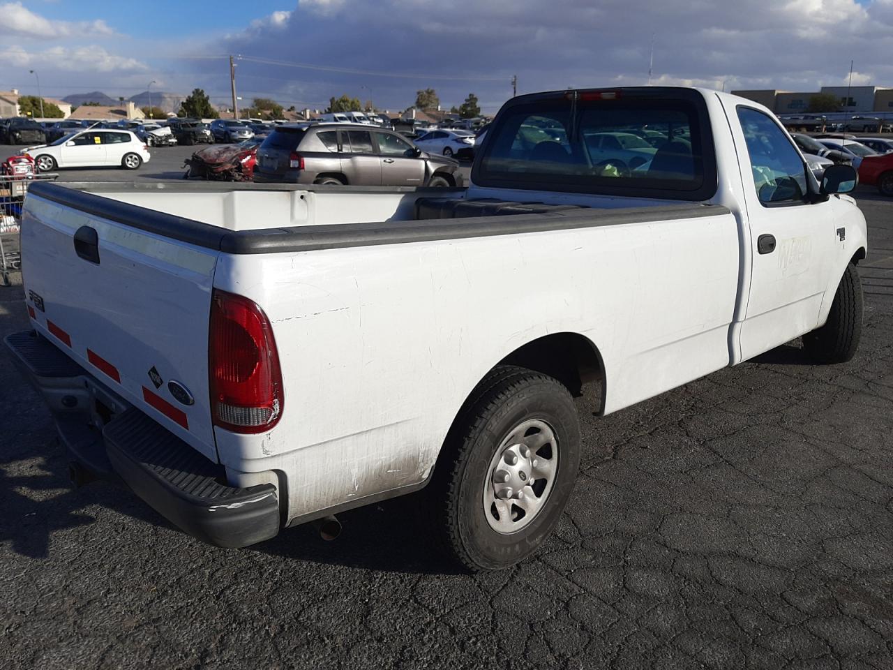 Photo 4 from auction – 2004 FORD F-150 HERI with VIN 2FTPF17Z34CA82313