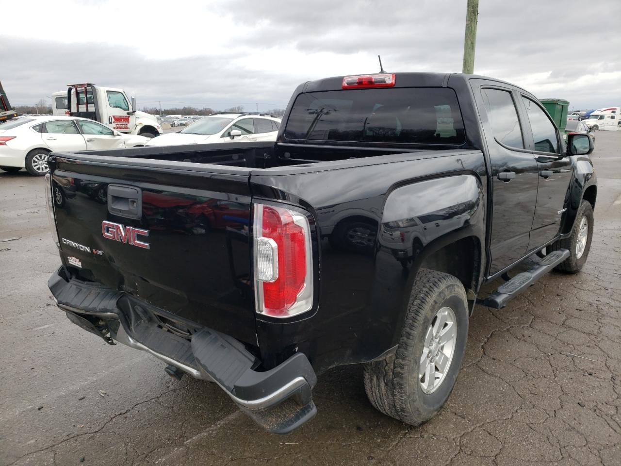 Photo 17 from auction – 2018 GMC CANYON with VIN 1GTG5BEN7J1140543