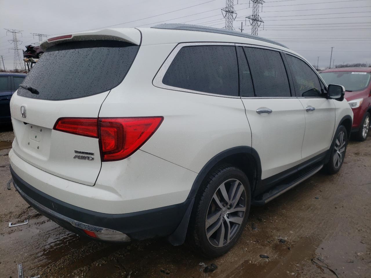 Photo 4 from auction – 2018 HONDA PILOT TOUR with VIN 5FNYF6H99JB059834