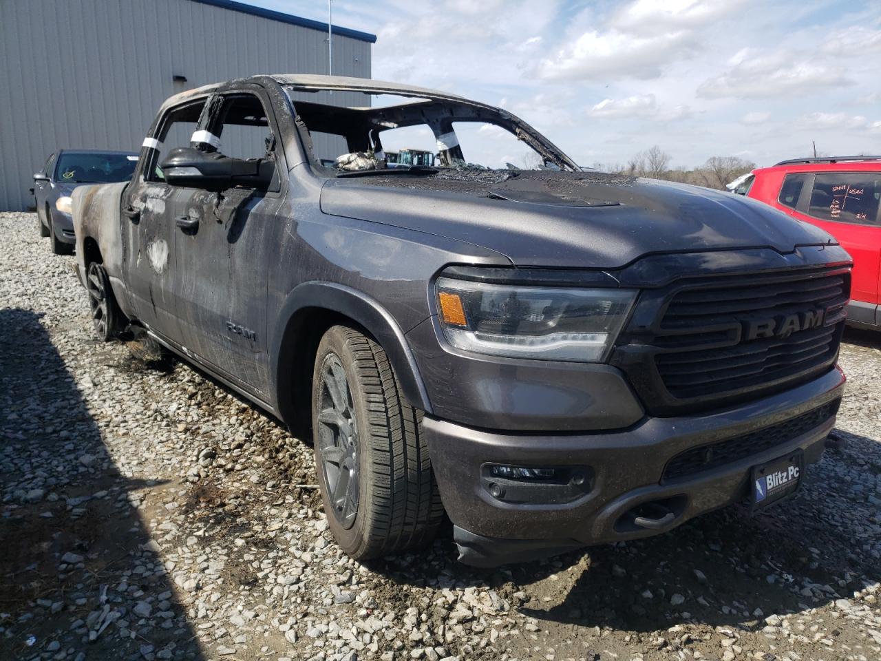 RAM 1500 LARAM 2021 with VIN 1C6SRFJT1MN624089 - Photo from auction