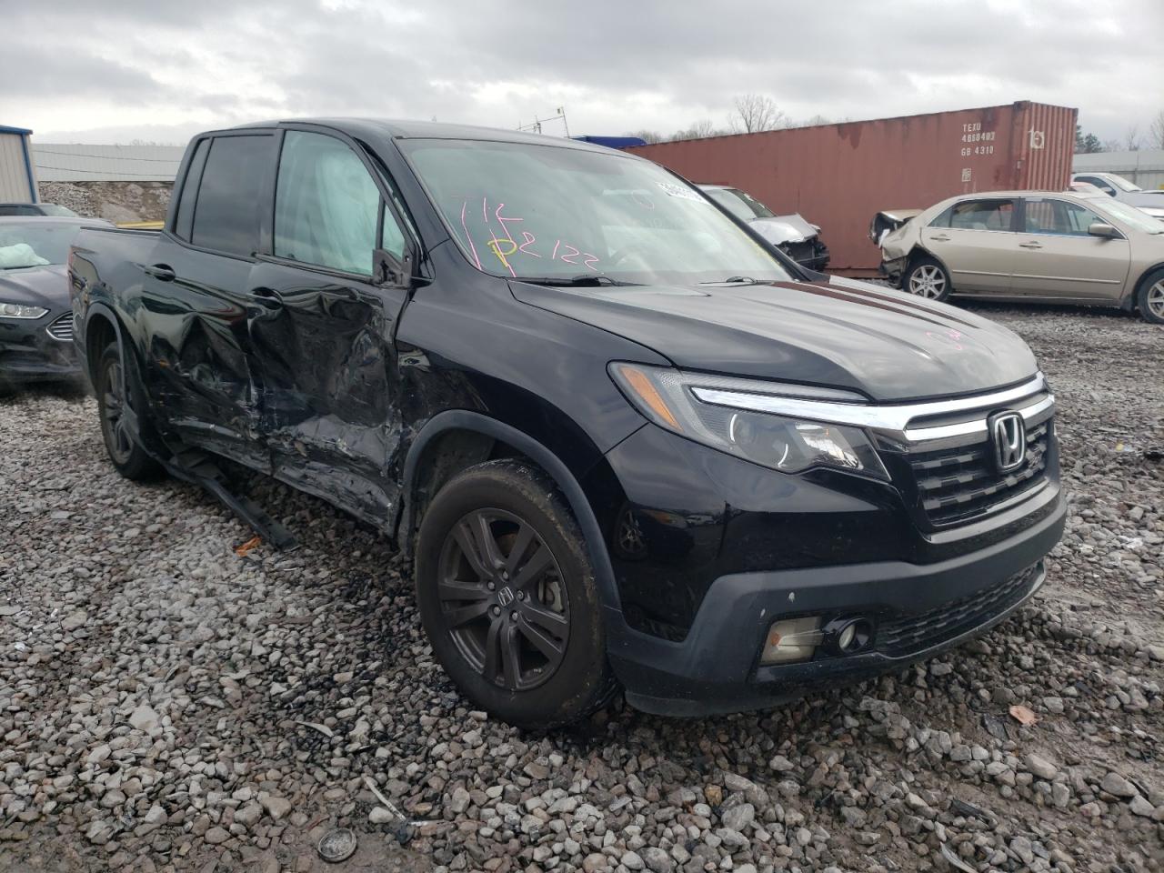 HONDA RIDGELINE 2017 with VIN 5FPYK2F1XHB001296 - Photo from auction