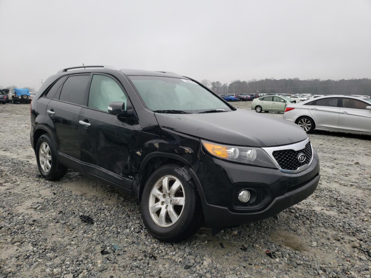 KIA SORENTO LX 2013 with VIN 5XYKT3A63DG379841 - Photo from auction