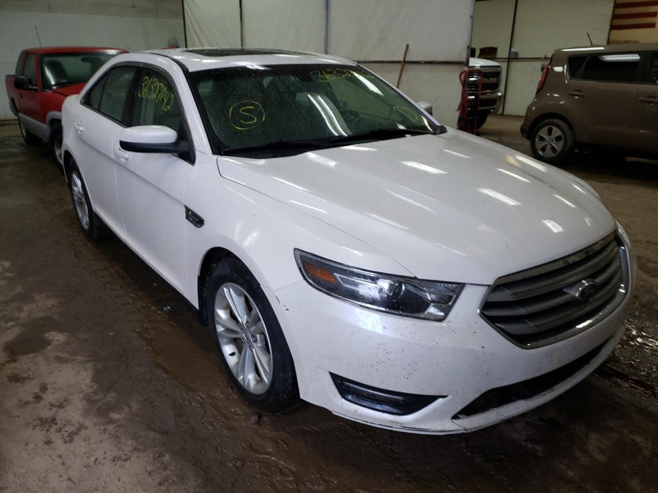 FORD TAURUS SEL 2016 with VIN 1FAHP2E82GG124402 - Photo from auction