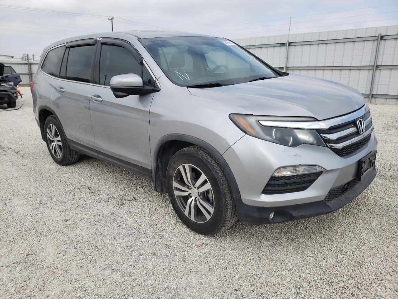 HONDA PILOT EXLN 2016 with VIN 5FNYF5H76GB050624 - Photo from auction
