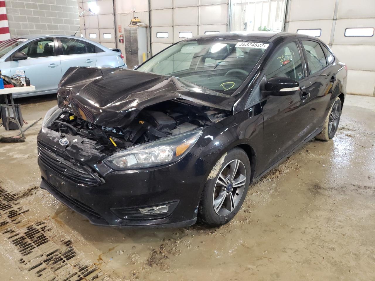 Photo 2 from auction – 2016 FORD FOCUS SE with VIN 1FADP3FE3GL225335
