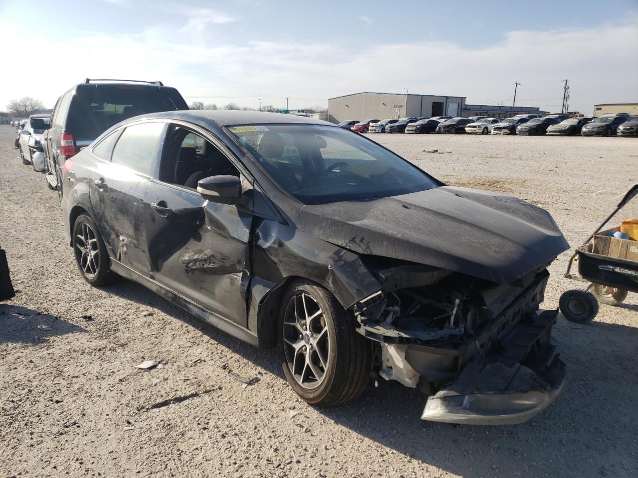 Photo 14 from auction – 2015 FORD FOCUS SE with VIN 1FADP3F24FL347660