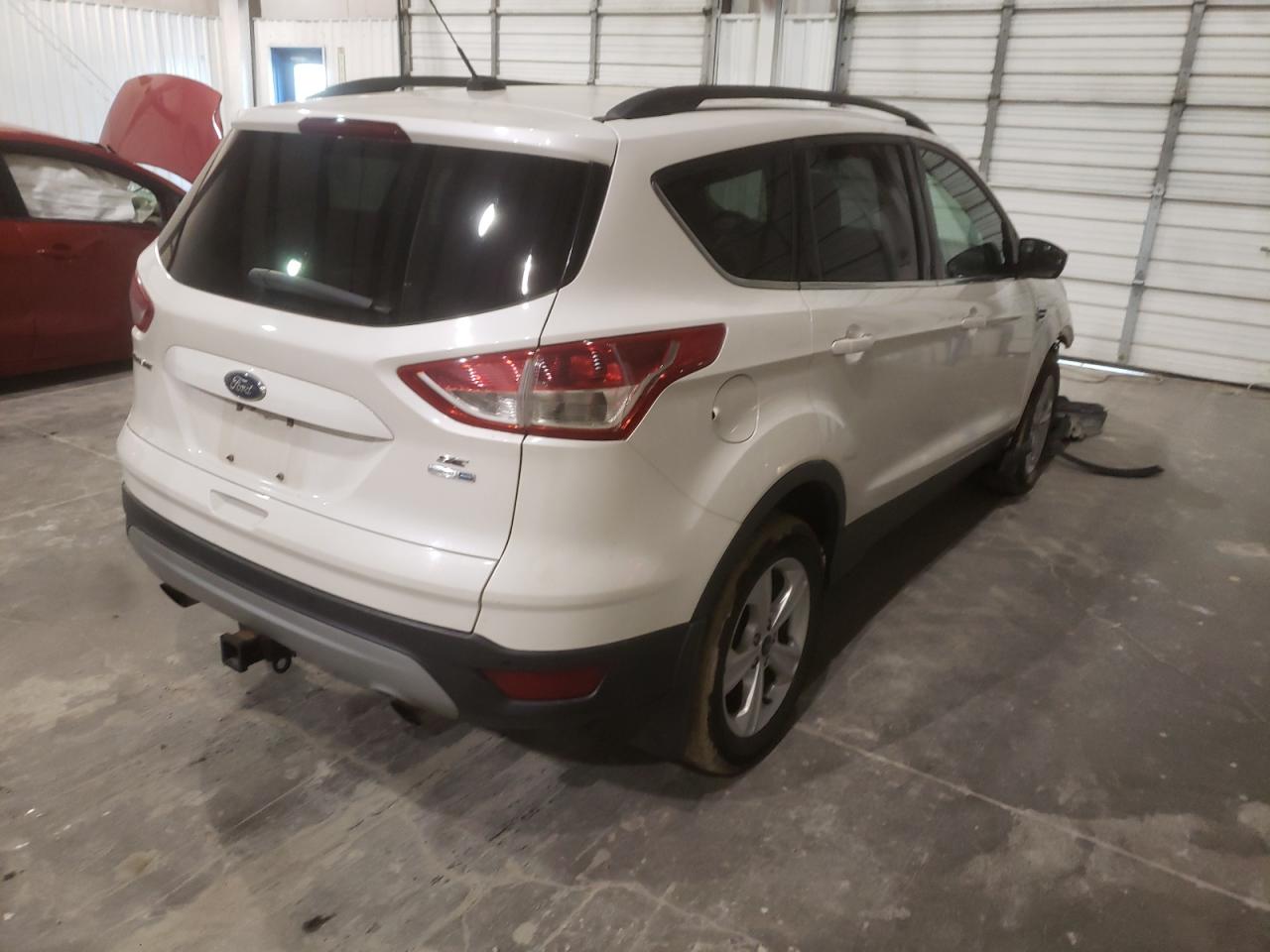 Photo 4 from auction – 2014 FORD ESCAPE SE with VIN 1FMCU9G92EUA29845