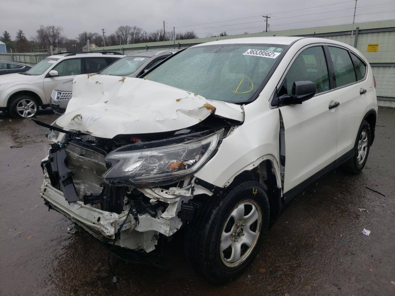 Photo 2 from auction – 2016 HONDA CR-V LX with VIN 5J6RM4H39GL021207