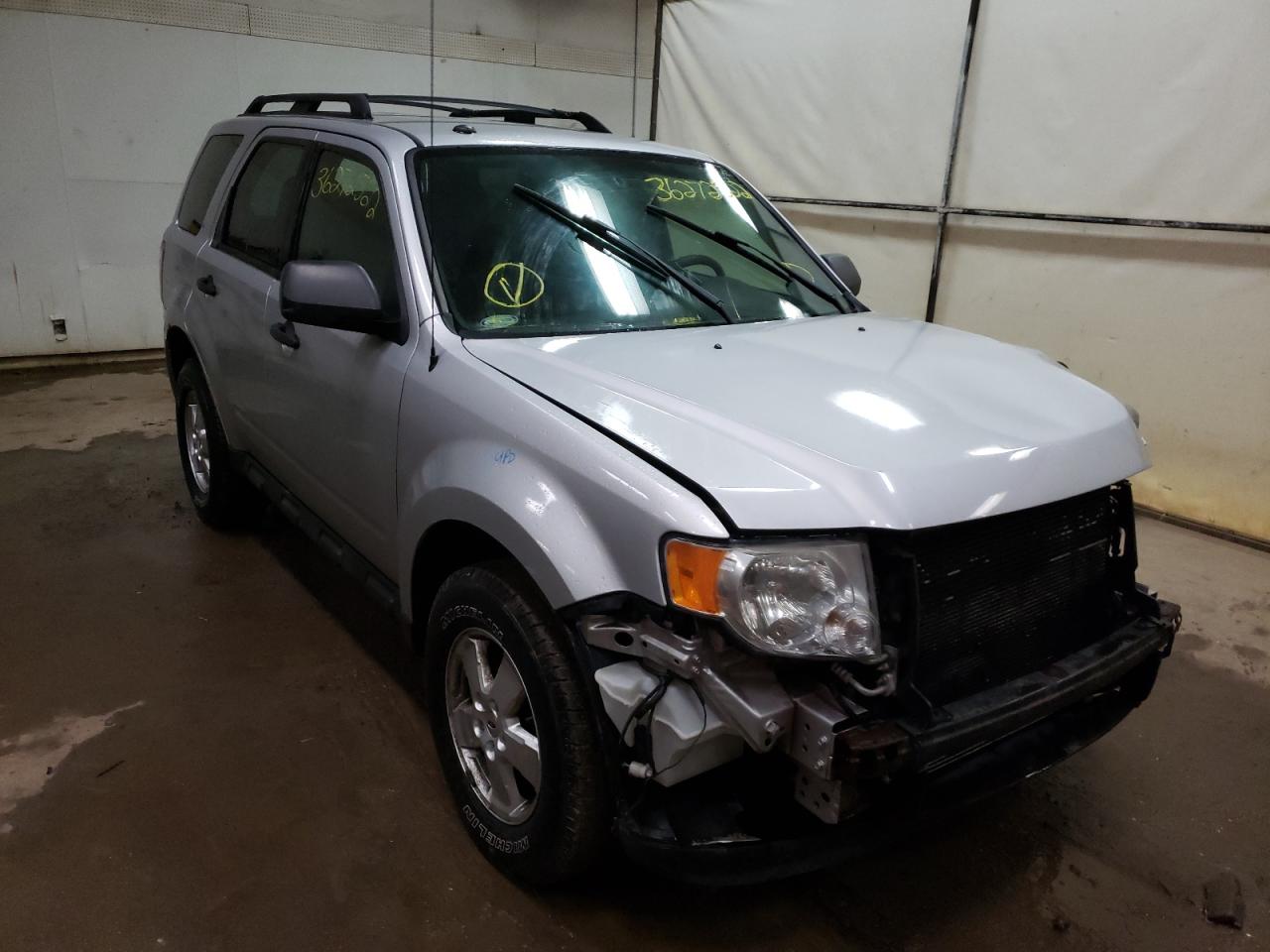 FORD ESCAPE XLT 2011 with VIN 1FMCU0DGXBKA10109 - Photo from auction