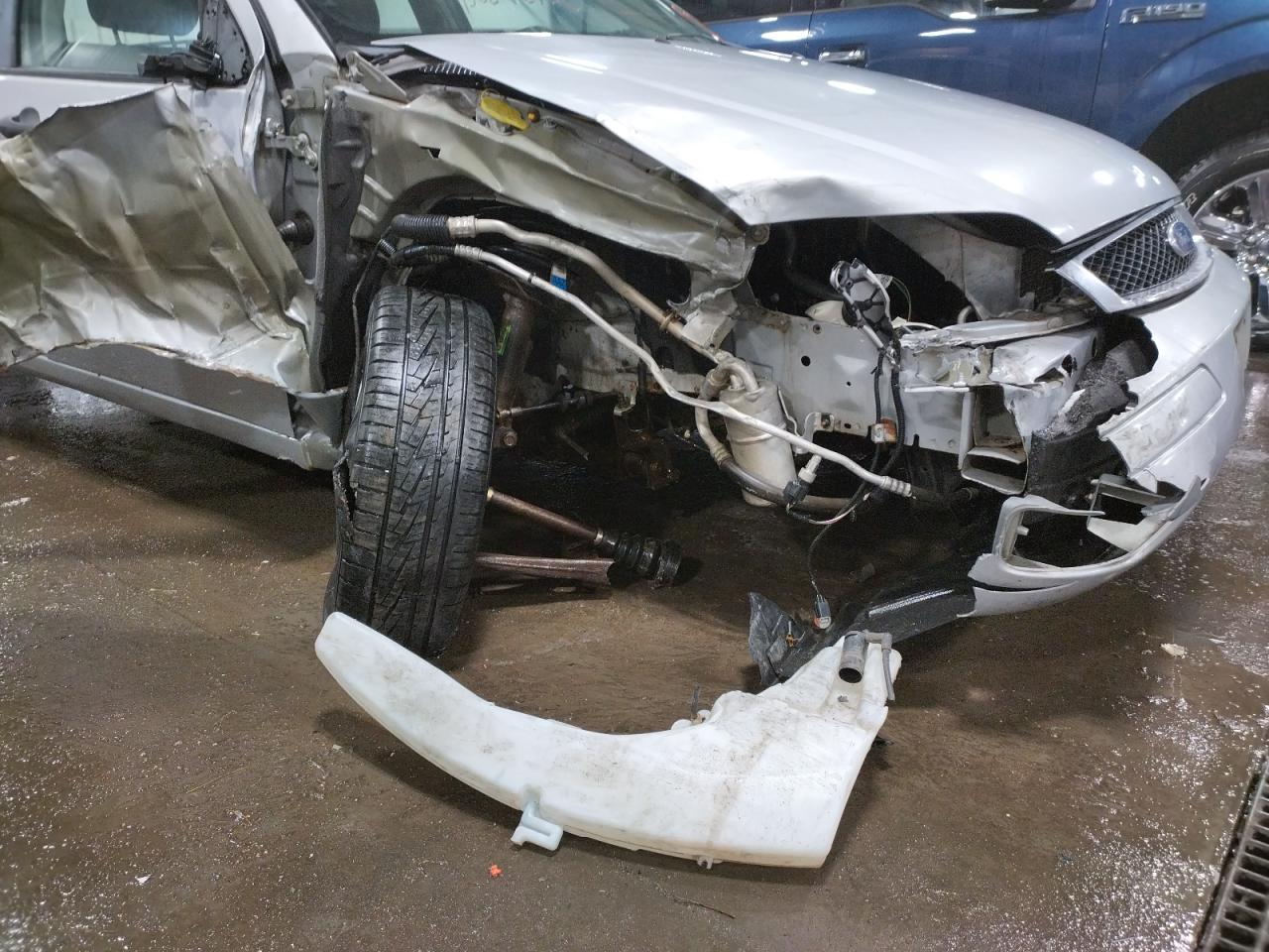 Photo 9 from auction – 2007 FORD FOCUS with VIN 1FAFP34N77W206779