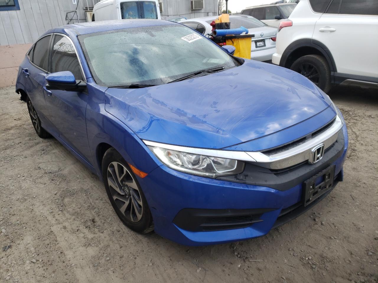 HONDA CIVIC EX 2018 with VIN 2HGFC2F7XJH523560 - Photo from auction