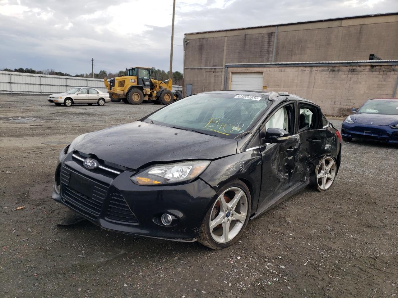 Photo 2 from auction – 2014 FORD FOCUS TITA with VIN 1FADP3J20EL166335